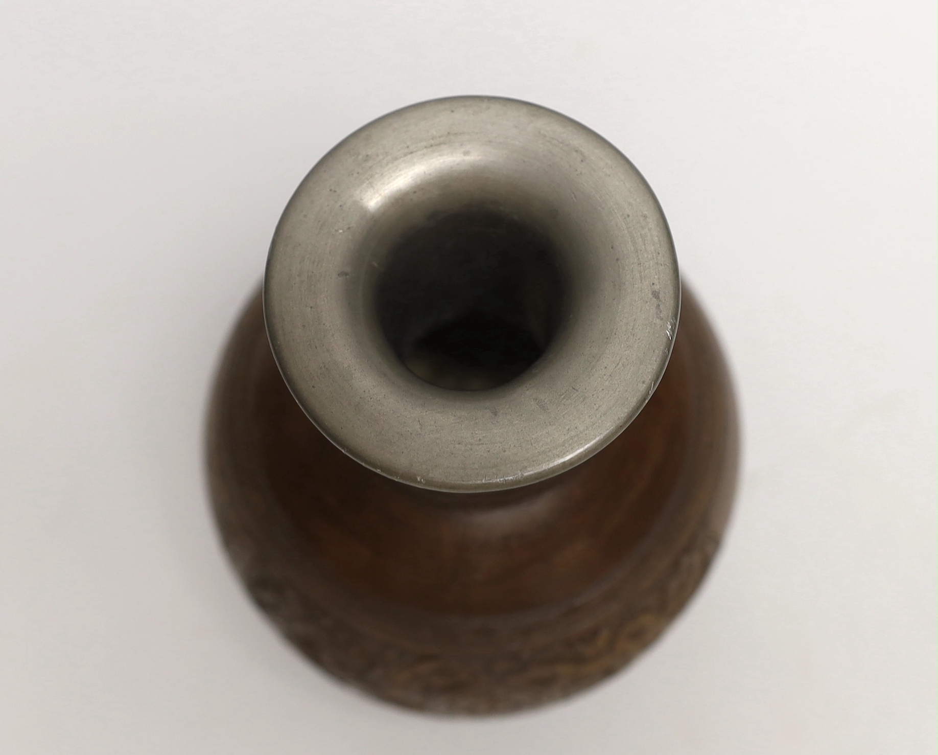 A Chinese coconut and pewter vase, 14cms high